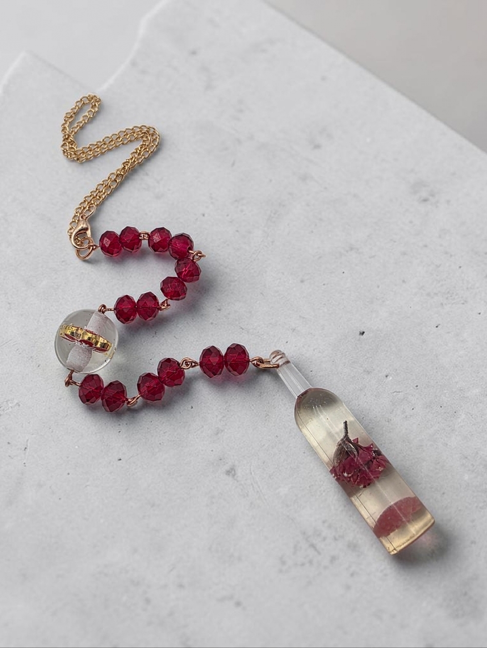 Handcrafted Gold Car Charm with Deep Red Beads and Bottle Resin Pendant
